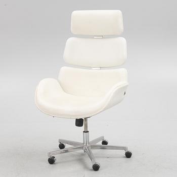 A contemporary swivel chair, Roche Bobois.