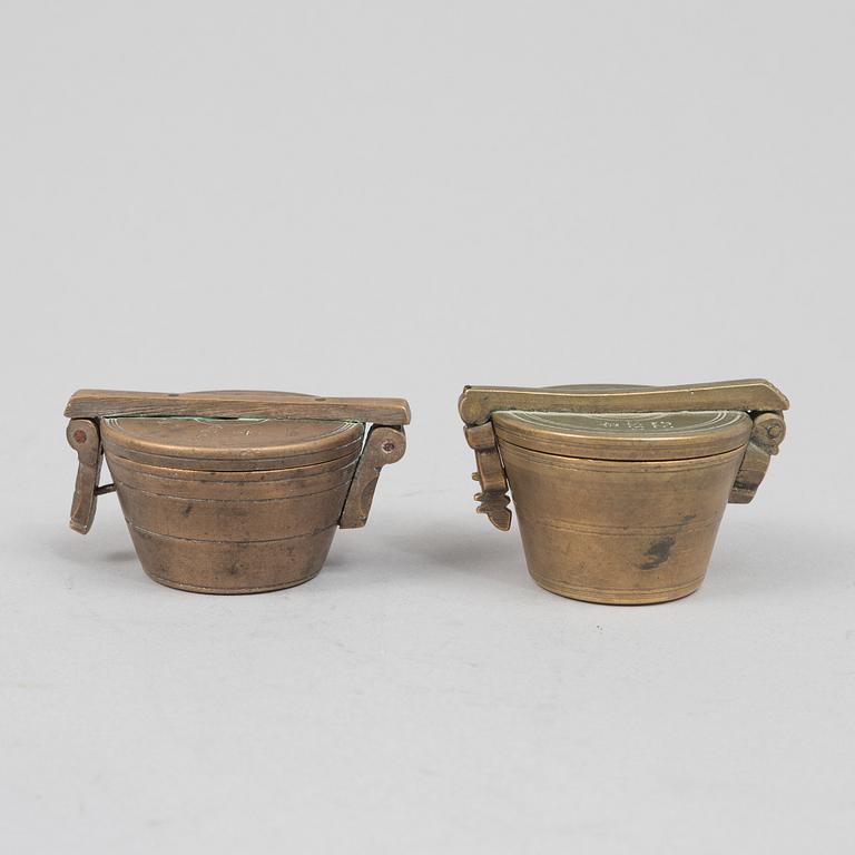 Two sets of brass weights, Sweden, 1820 and 1931.
