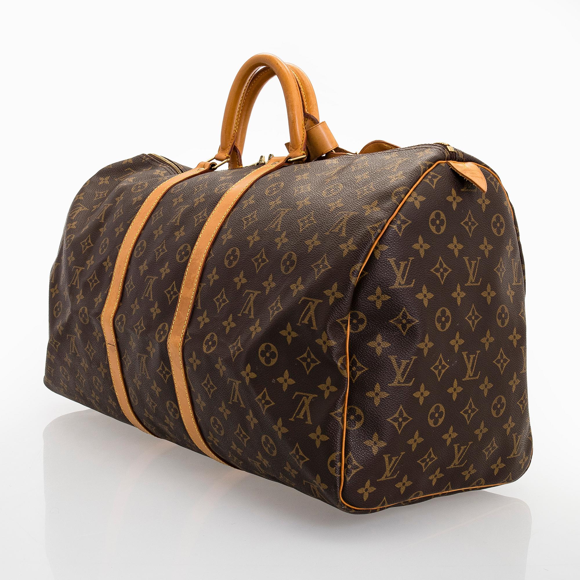 Louis Vuitton, a Monogram Canvas 'Keepall 55' bag.