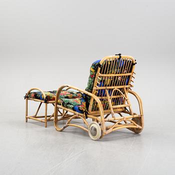 An armchair with ottoman, bamboo and rattan, second half of the 20th century.