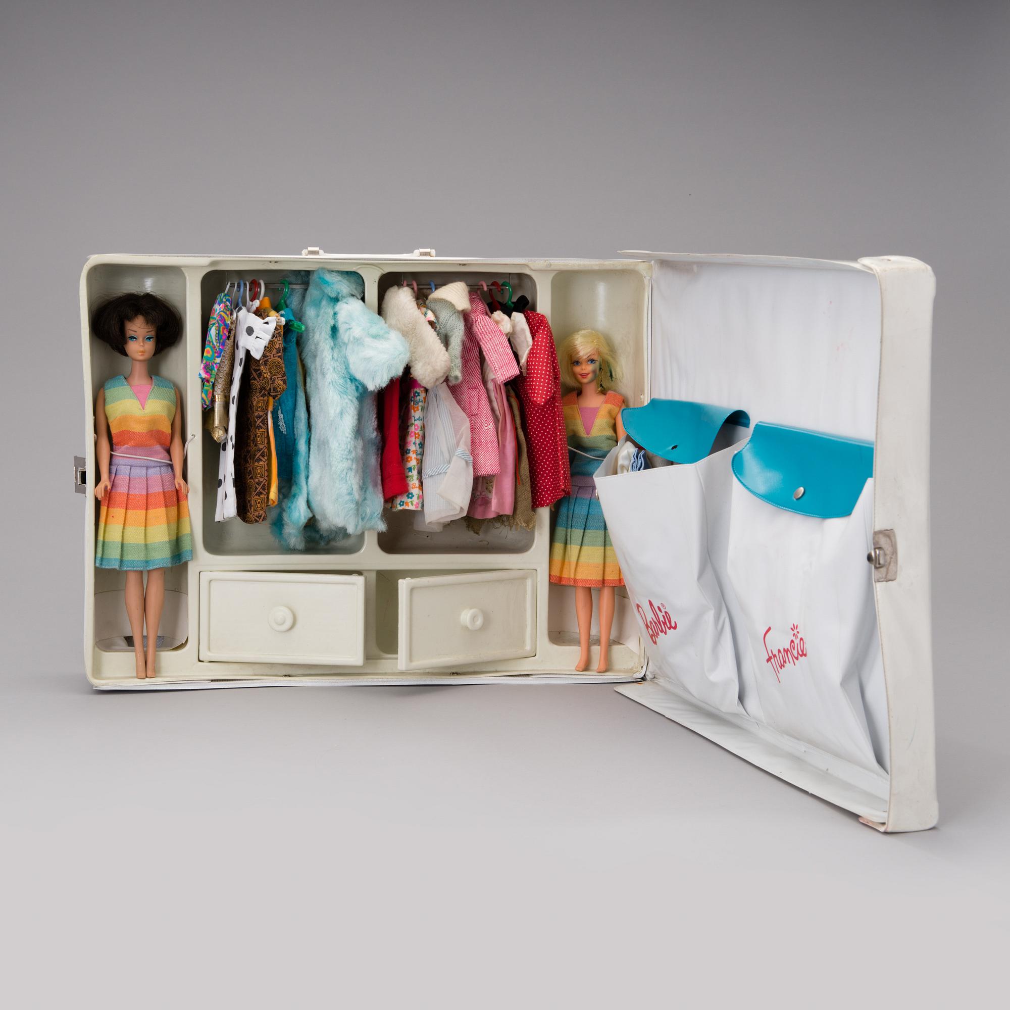 Two dolls, Barbie and Francie, with clothes and in original case, Mattel 1960s.