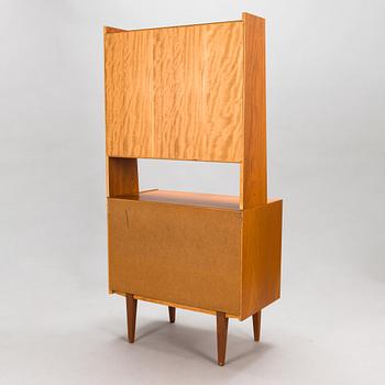 A mid-20th century bookshelf.
