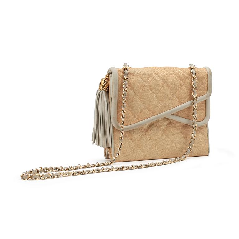 CHANEL, a beige shoulder bag.