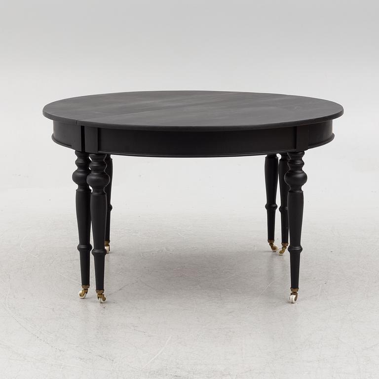 A dining table, late 19th Century.