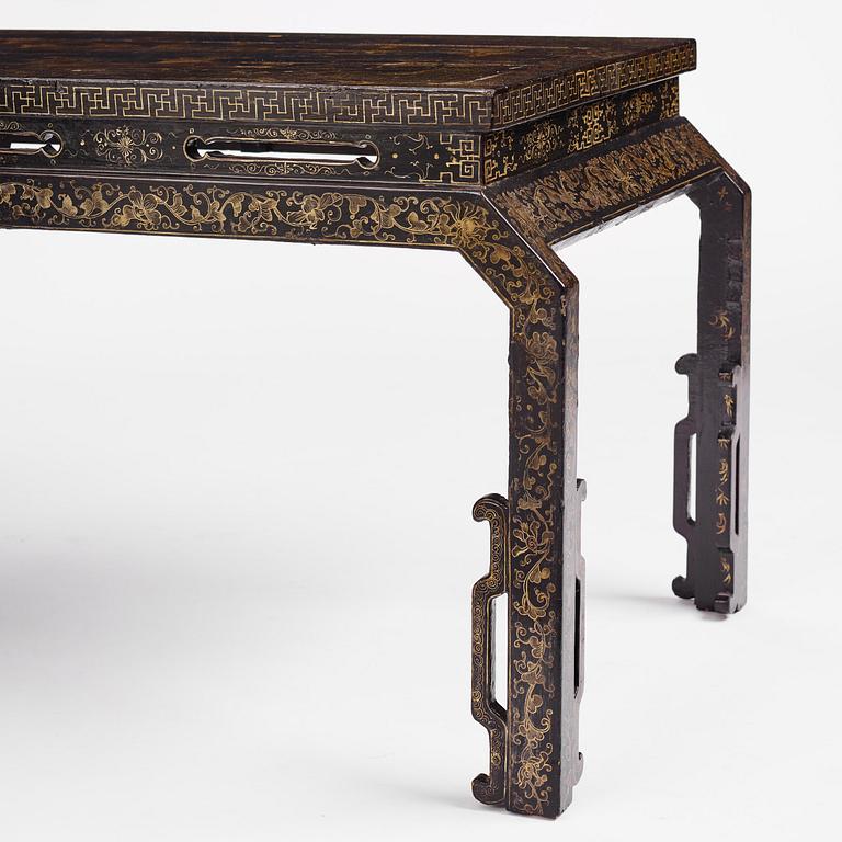 A Chinese painted black lacquer low table, Qing dynasty.