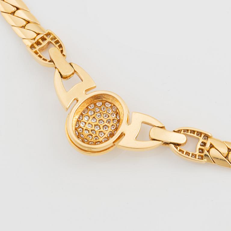 A Cartier 18K gold necklace set with round brilliant-cut diamonds.