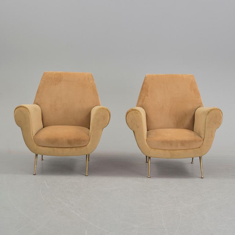 A pair of  mid-20th century lounge chairs by Gigi Radice, Minotti.