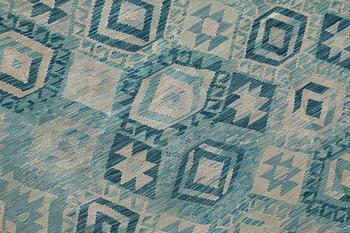 A Kelim carpet, 292 x 252 cm.