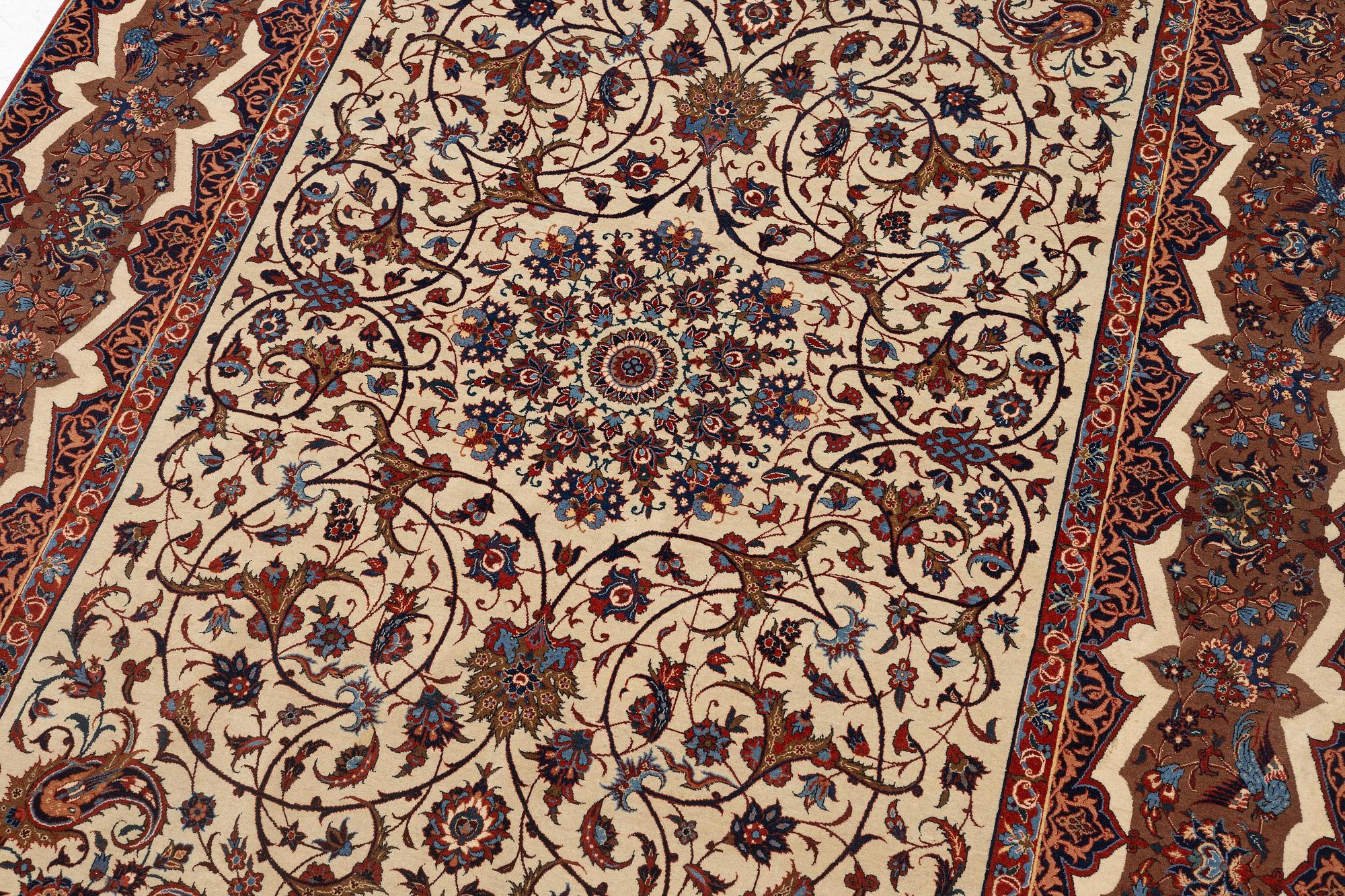 An antique Isfahan rug, Central Iran, c. 228 x 139 cm.