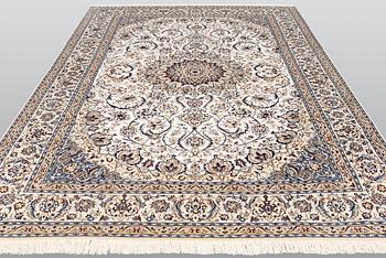 A carpet, Nain part silk so called 9LAA, ca 375 x 244 cm.