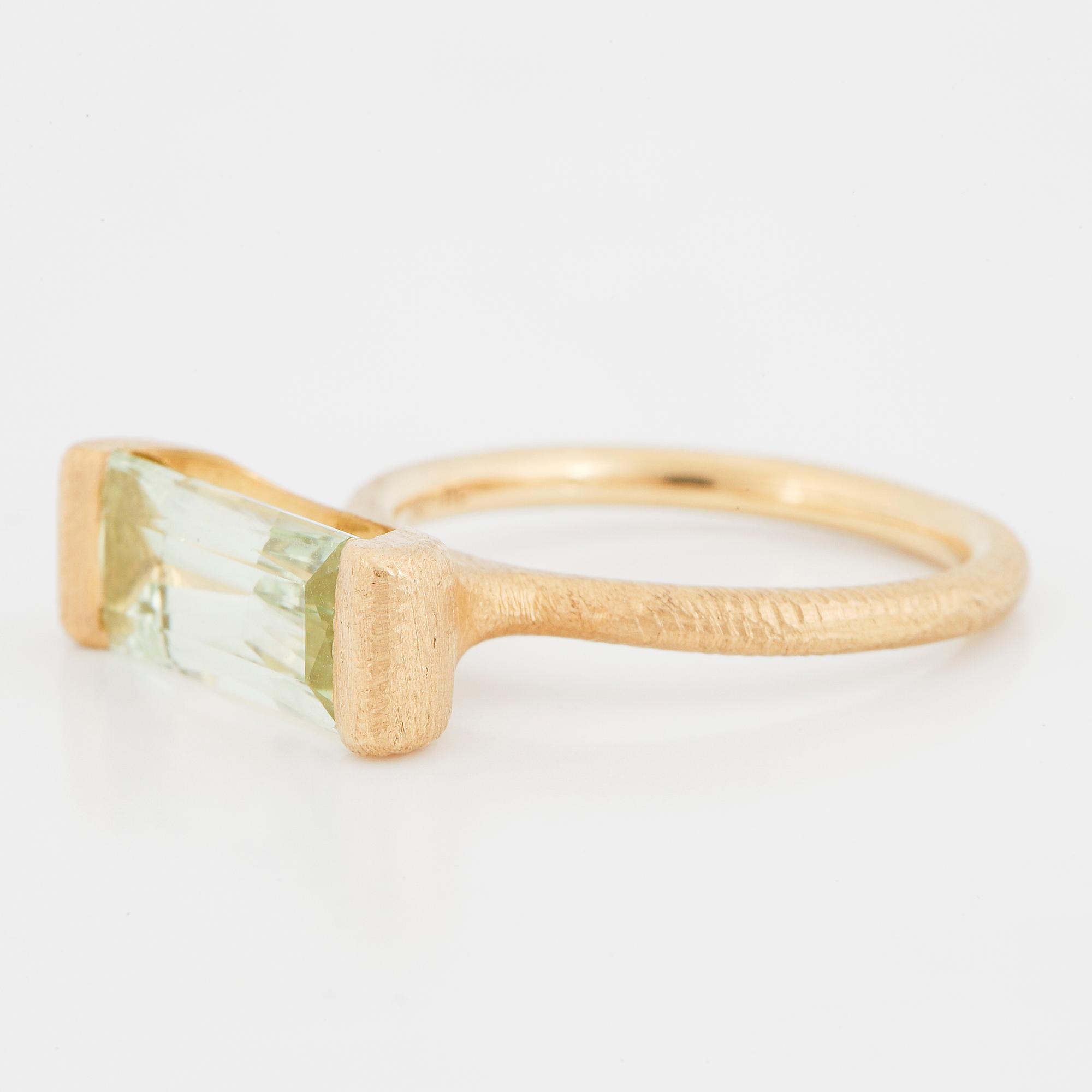 DULONG, a faceted aquamarine "Future" ring.