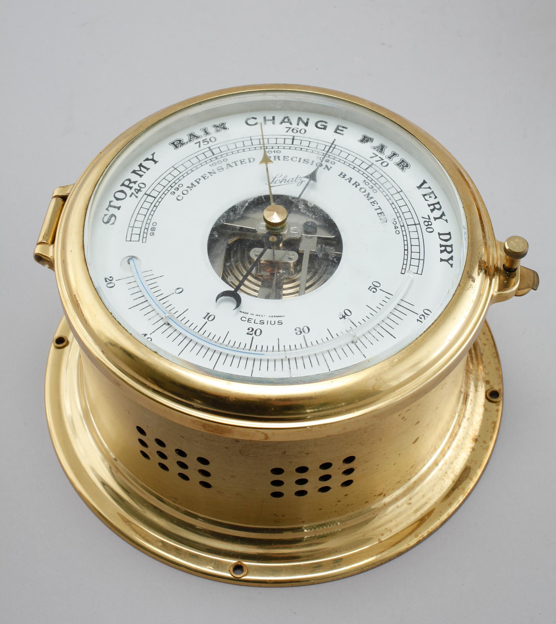 A wall clock and a barometer from Schatz, made in the fourth quarter of the 20th century.