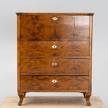 A birch-veneered dresser, second half of the 19th century.