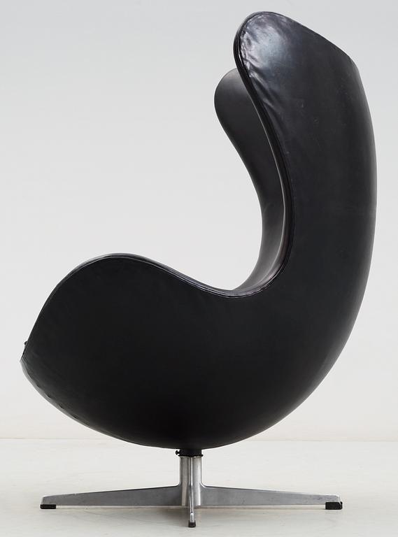 An Arne Jacobsen black leather and steel 'Egg Chair', Fritz Hansen, Denmark 1960's.