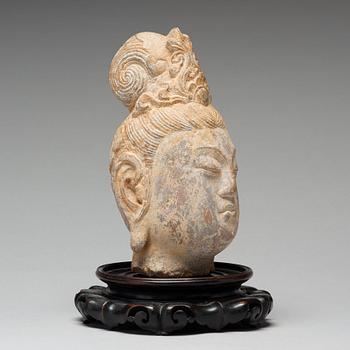 A stone sculpture of Guanyin, presumably Ming dynasty, 17th Century.