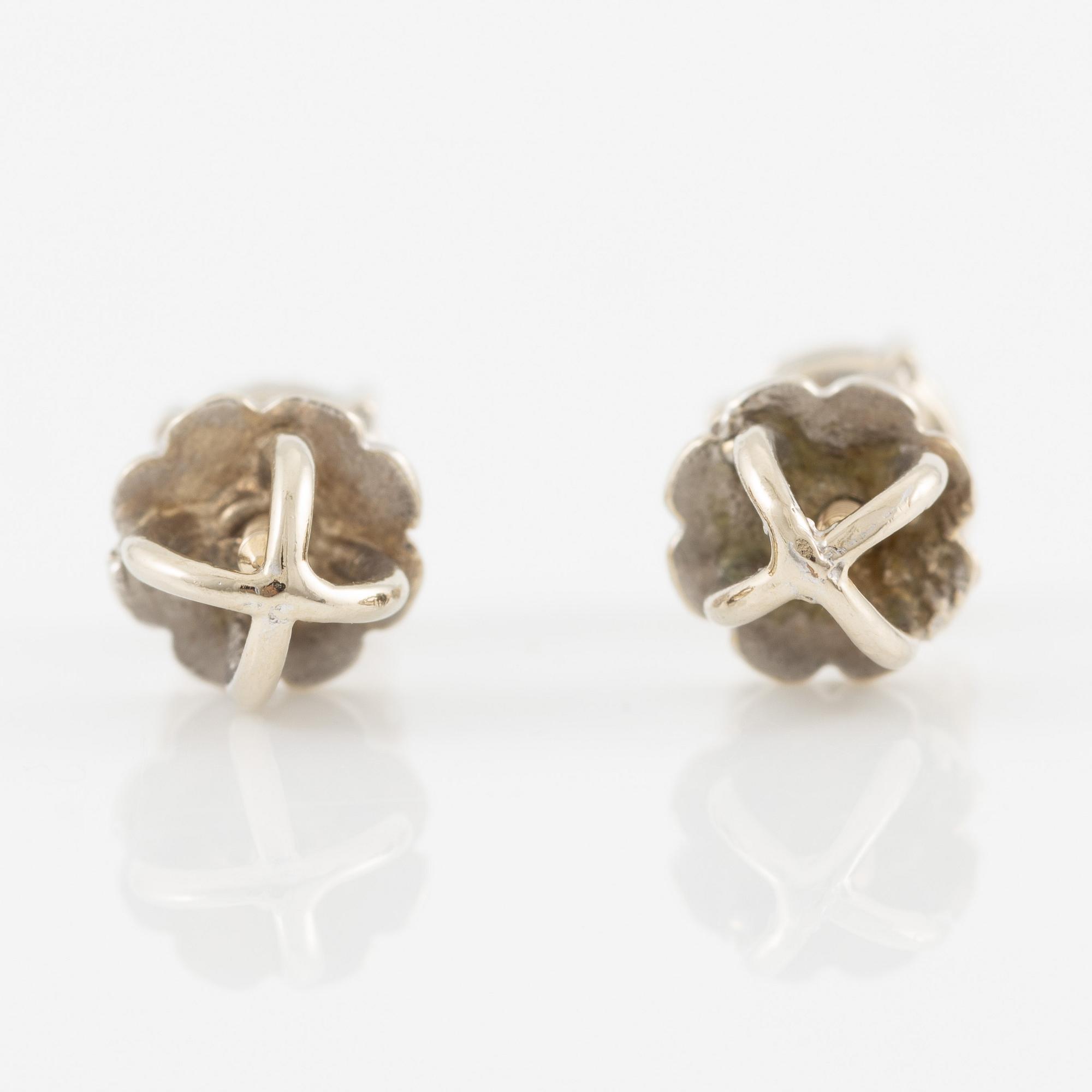 Earrings, a pair, 14K white gold and brilliant-cut diamonds.