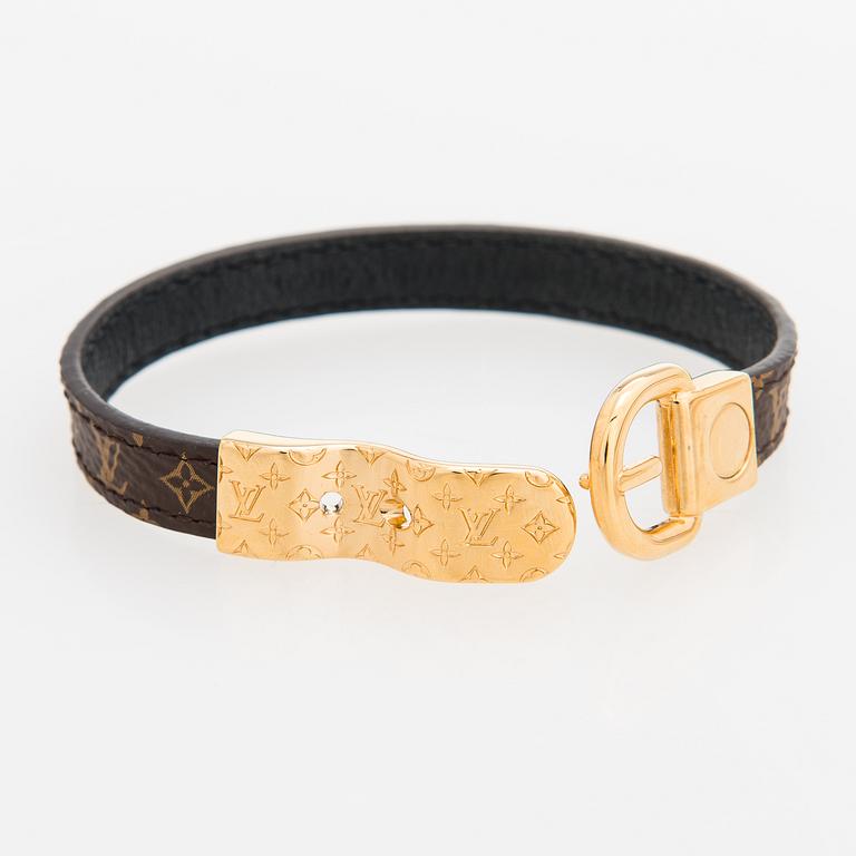 Louis Vuitton, "Fasten your LV" bracelet. Marked Louis Vuitton Paris, Made in Spain.