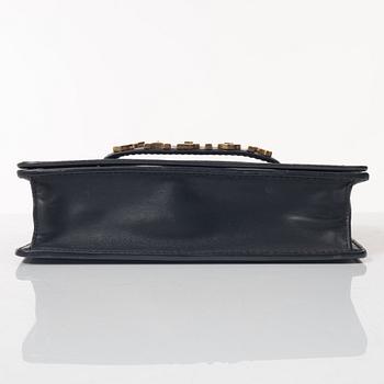 Christian Dior, A black leather "Dio(r)evolution" bag.