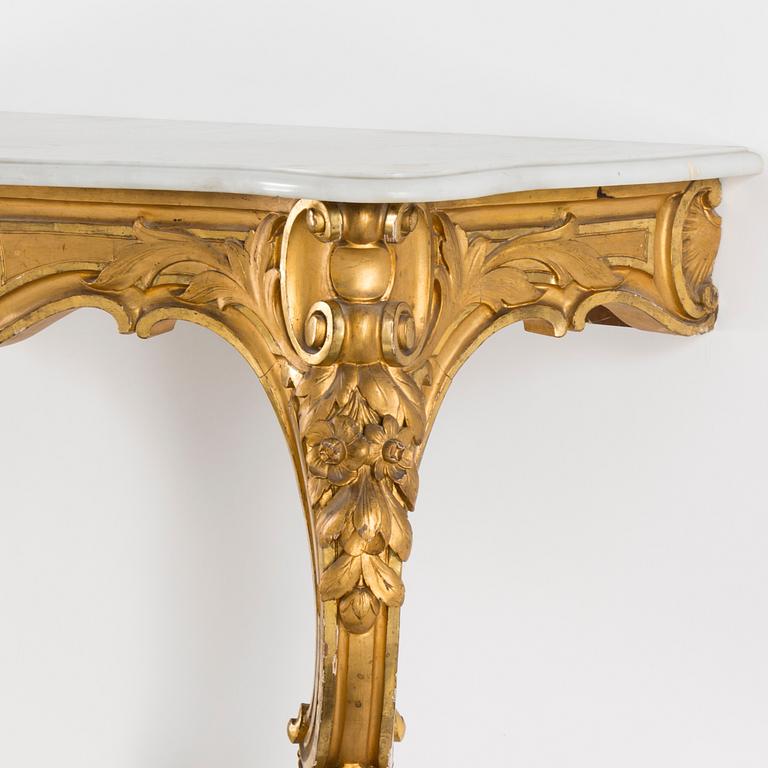 A gilt wood mirror and marble top console table, early 20th Century.