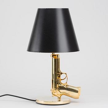 PHILIPPE STARCK, a Flos "Gun Bedside Lamp".