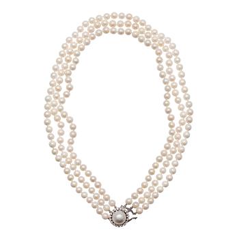 348. A NECKLACE, 3 strand akoya pearls 6 - 6,5 mm. Length c. 45 cm.