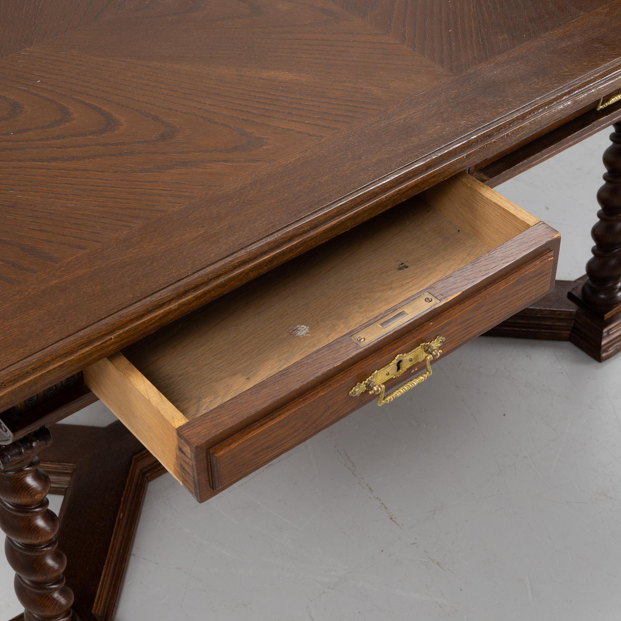 A writing desk / library table, circa 1900.