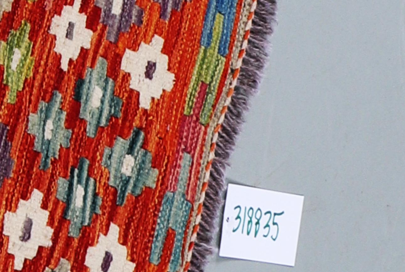 A runner kilim, ca 291 x 84 cm.