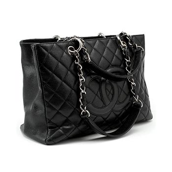 640. CHANEL, a black caviar leather purse, "Grand Shopping Tote".