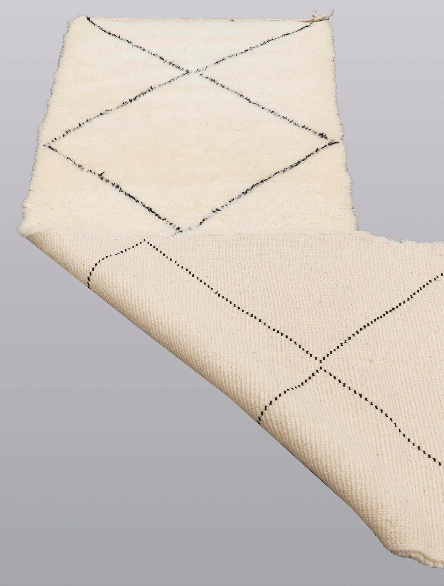 A Moroccan runner carpet, 275 x 90 cm.