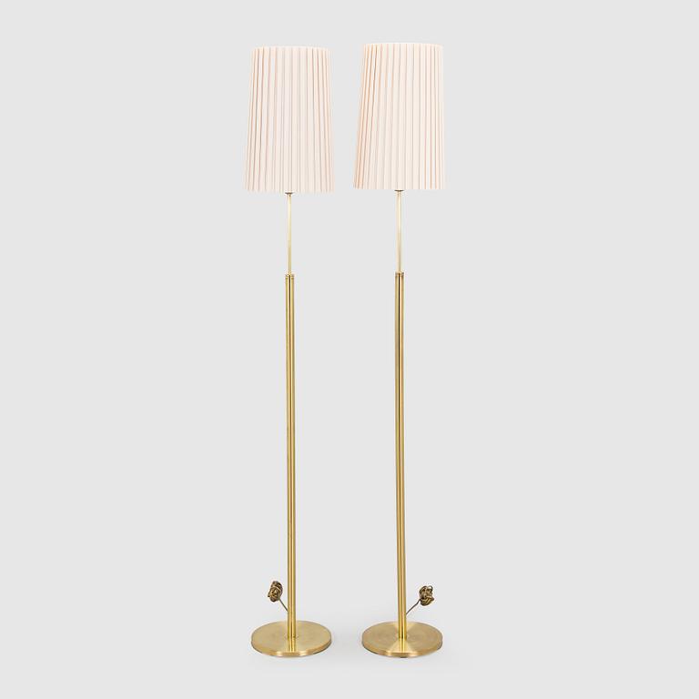 A pair of late 20th century floor lamps.