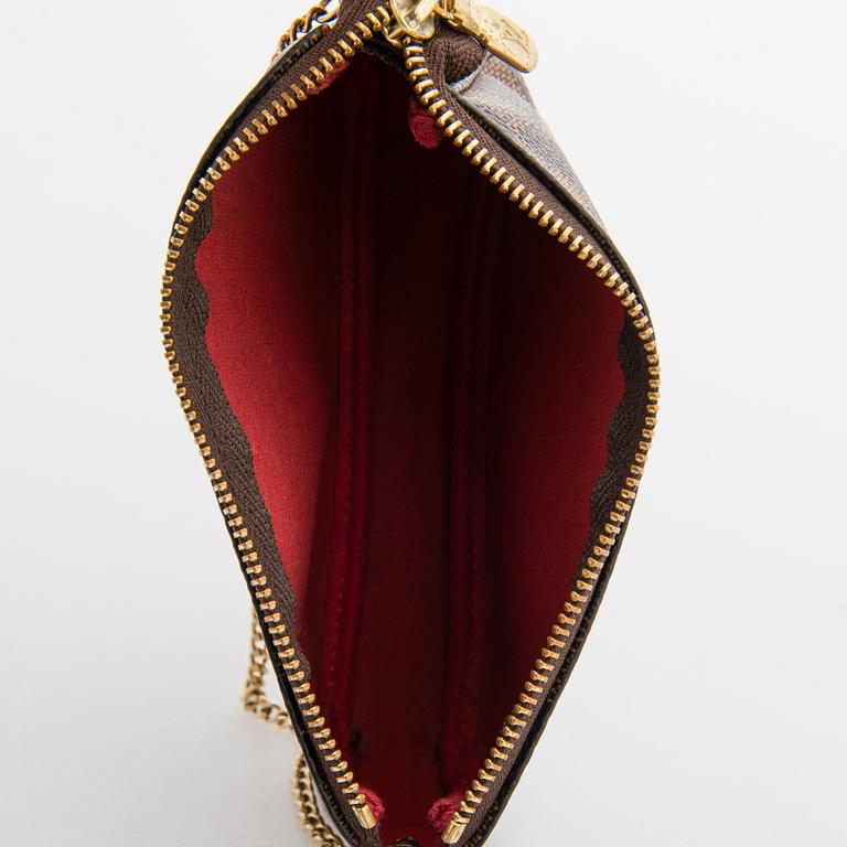 Louis Vuitton, "Neverfull GM" laukku samt pochette.