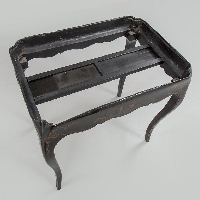 A Swedish Rococo faience tea table, Marieberg 1770.