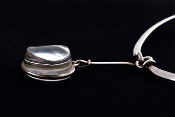 Vivianna Torun Bülow-Hübe. Necklace with pendant, sterling silver and rock crystal or glass.
