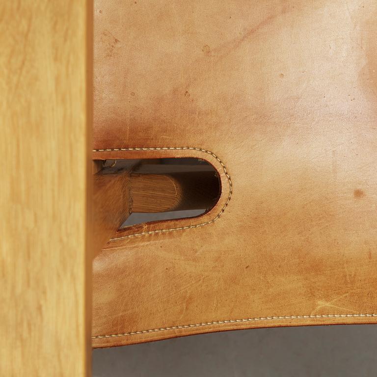 A pair of Børge Mogensen oak and leather 'Spanish Chair', Fredericia Møbelfabrik, Denmark.