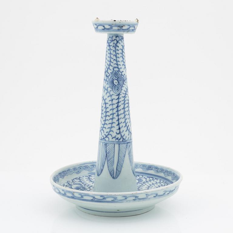 A blue and white Chinese candles stick/joss stick holder, circa 1900.