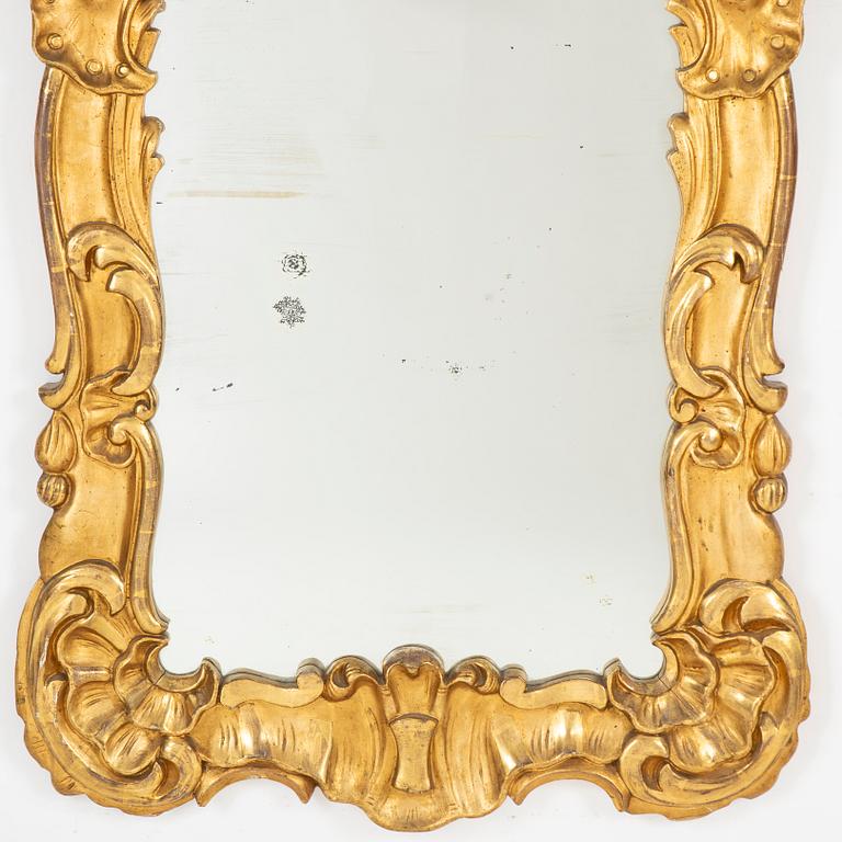 A Rococo style mirror, 19th Century.