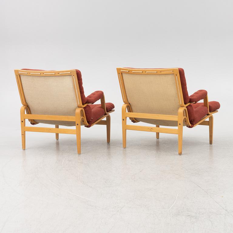 Bruno Mathsson, a pair of 'Ingrid' armchairs, Dux.