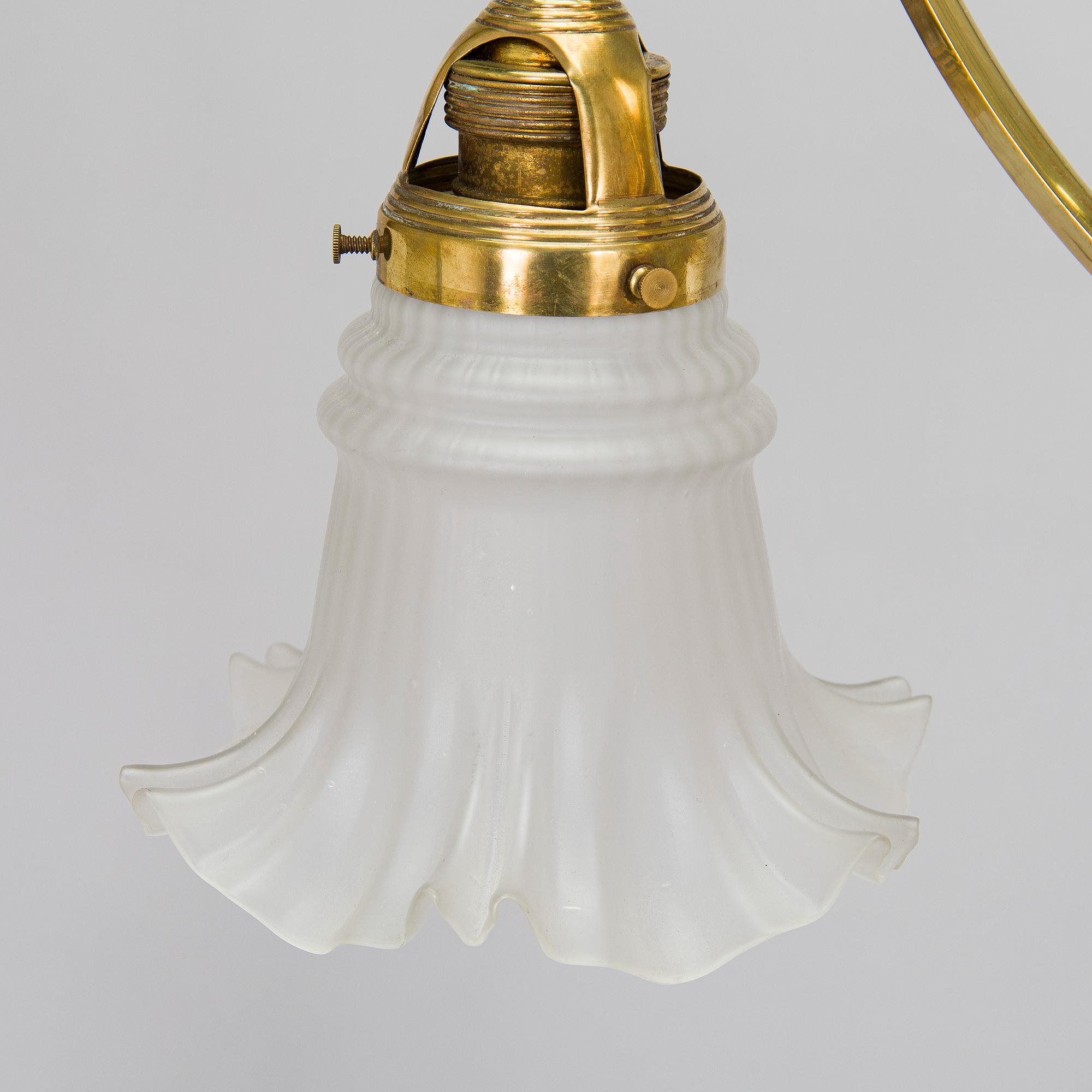 Kattovalaisin, 1900-luvun alku.