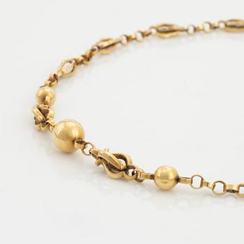 18K gold necklace.