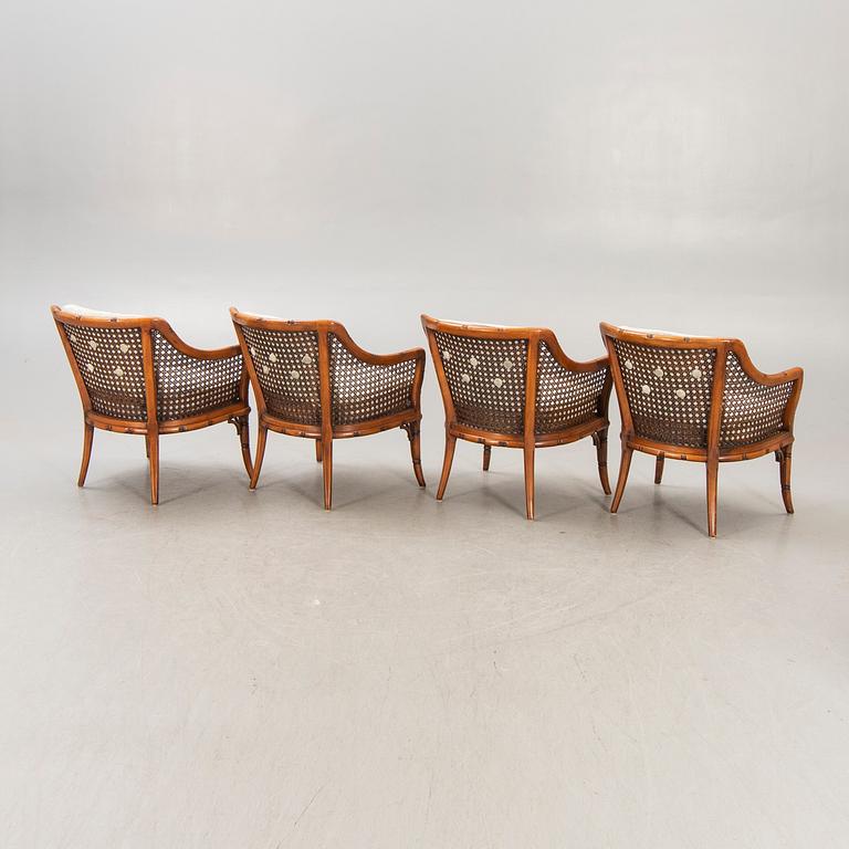 A set of four imitated bamboo and rattan easy chairs later part of the 20th century.