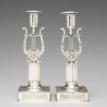 A pair of Swedish 19th century silver cadlesticks, mark of Johan Petter Grönvall, Stockholm 1823.