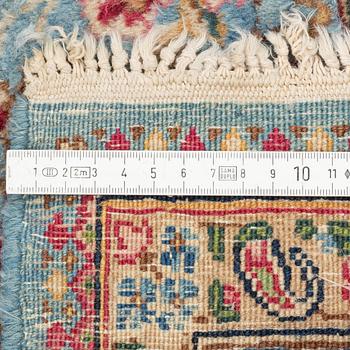 A Persian rug, c. 220 x 140 cm.