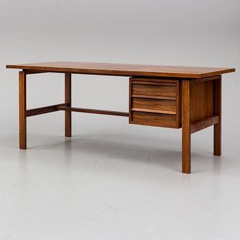 SVEND AAGE MADSEN, a Danish rosewood veneered desk, Sigurd Hansen, 1960's.