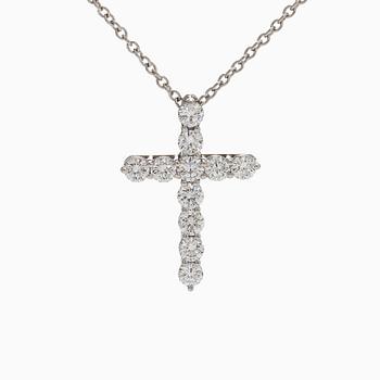 Tiffany & Co, a platinum cross pendant necklace with brilliant-cut diamonds.