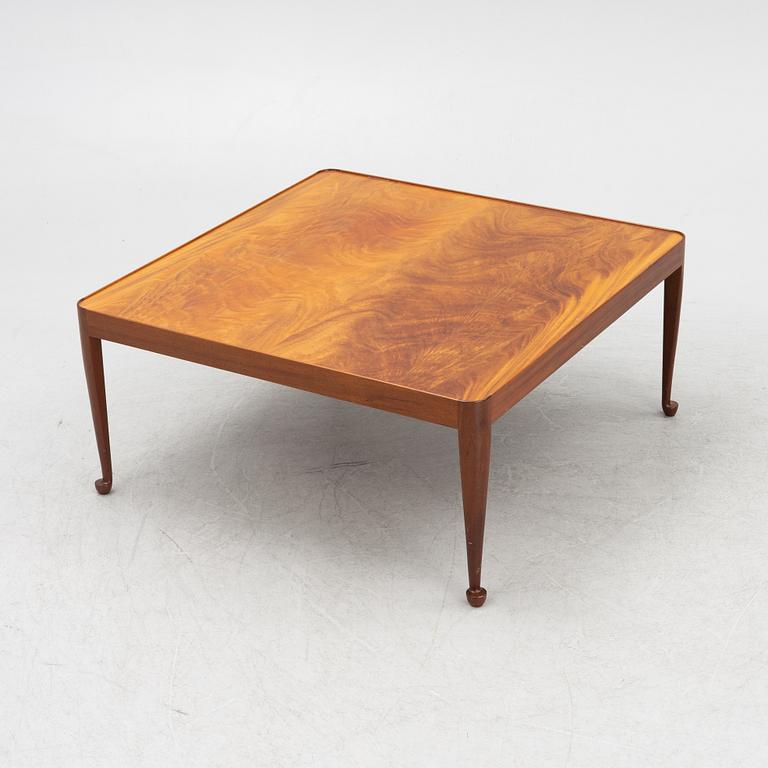 Josef Frank, a coffee table, model 2073, "Diplomat", by Svenskt Tenn, post 1985.