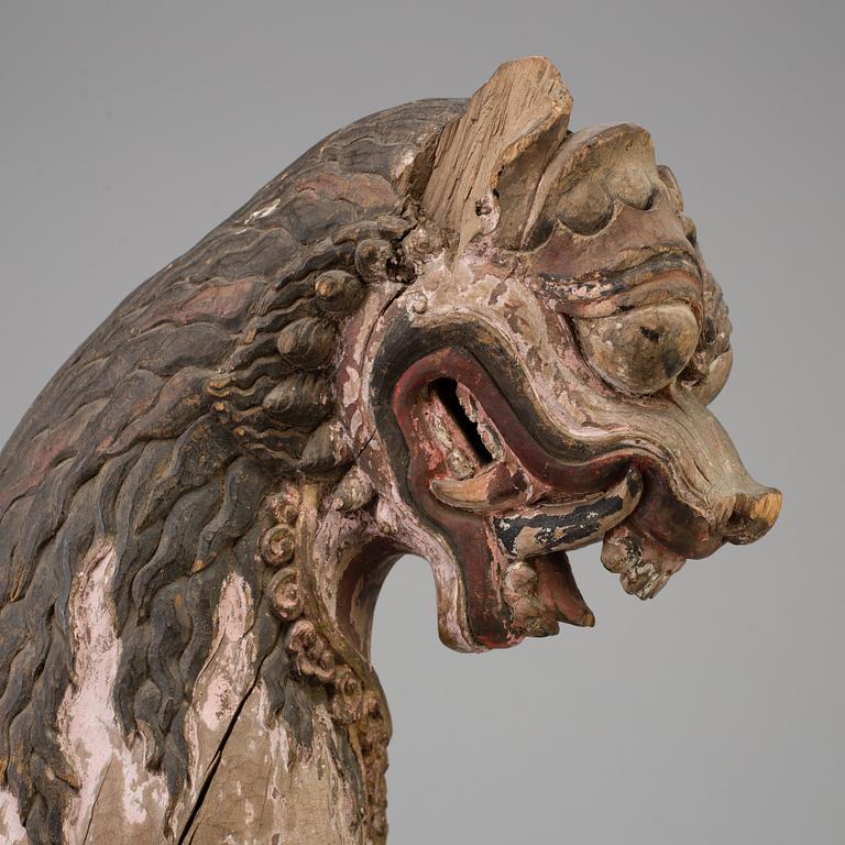 A wooden mythical beast, Southeast Asia, early 20th Century.
