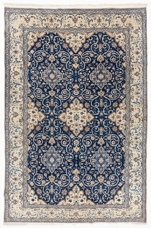 A carpet, possibly Yasd, c. 459 x 309 cm.