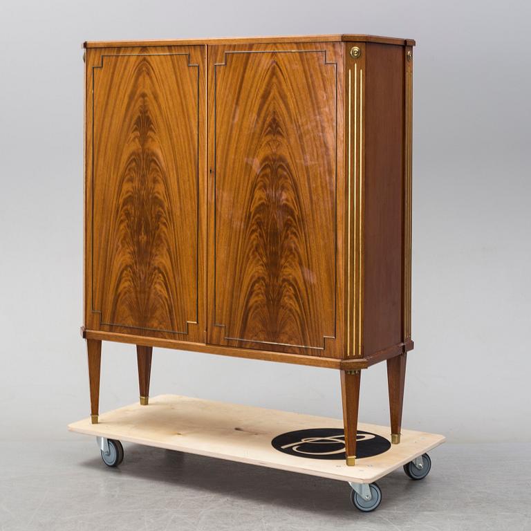 A 1950s mahogany veneered cabinet by Bodafors.