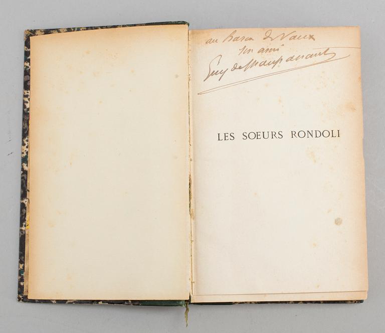 BOOK, inscribed by Maupassant.