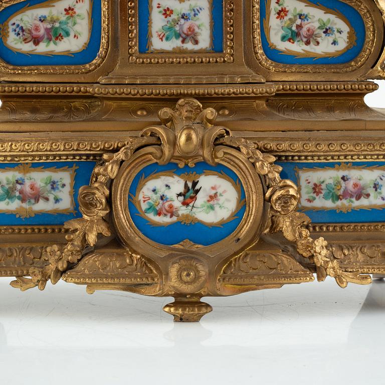 A Louis XVI-style mantel clock, France, circa 1900.